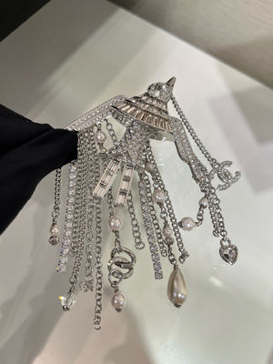 Silver-Tone Flying Bird Design Full Diamond Luxury Brooch with Double C Pearl-Studded Chain Tassel