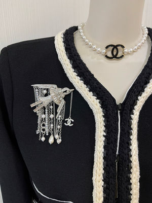 Silver-Tone Flying Bird Design Full Diamond Luxury Brooch with Double C Pearl-Studded Chain Tassel