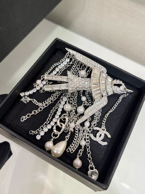 Silver-Tone Flying Bird Design Full Diamond Luxury Brooch with Double C Pearl-Studded Chain Tassel