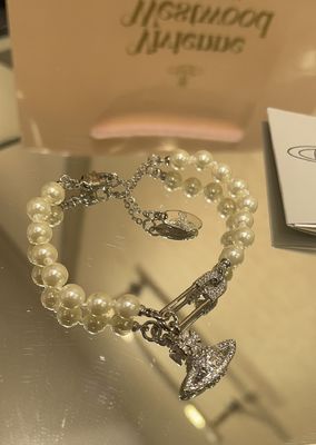 Vivienn* Westwo*d Full-Rhinestone Silver Saturn Brooch Bracelet with 18K Gold Plated Chain and Swarovsk* Pearl