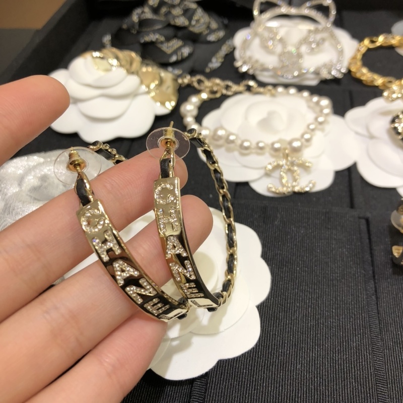 Black Cowleather Swarovsk* Diamond Statement Earrings with Push Back Closure